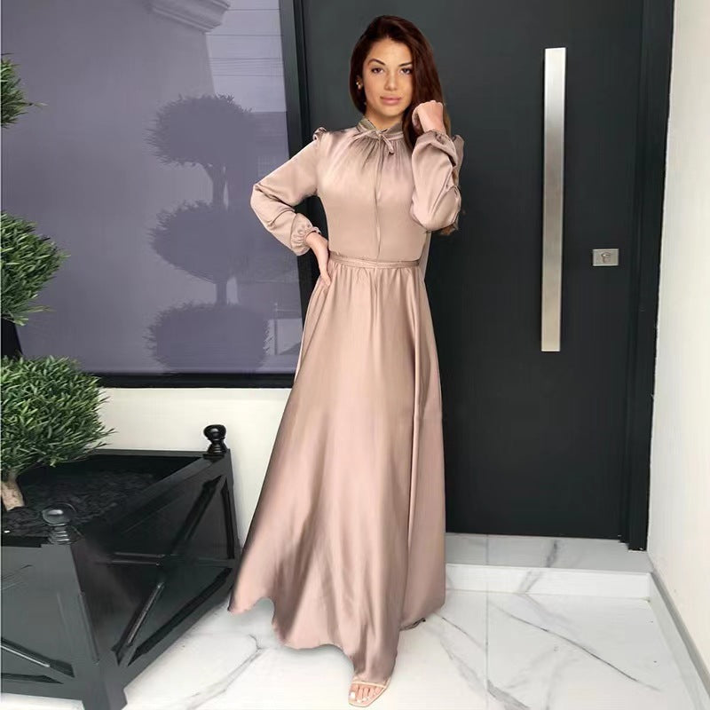 Women's maxi dress made of flowing satin with stand-up collar and tie belt Mune Fashion