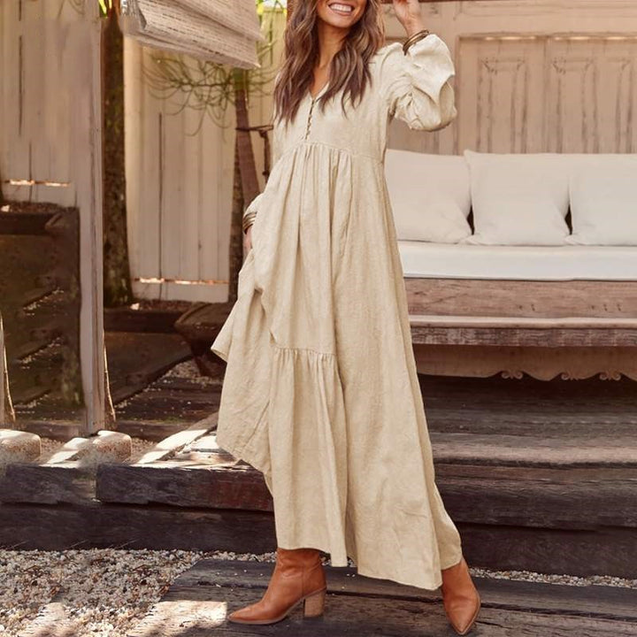 Women's airy maxi dress with V-neck, long sleeves, and inseam pockets Mune Fashion
