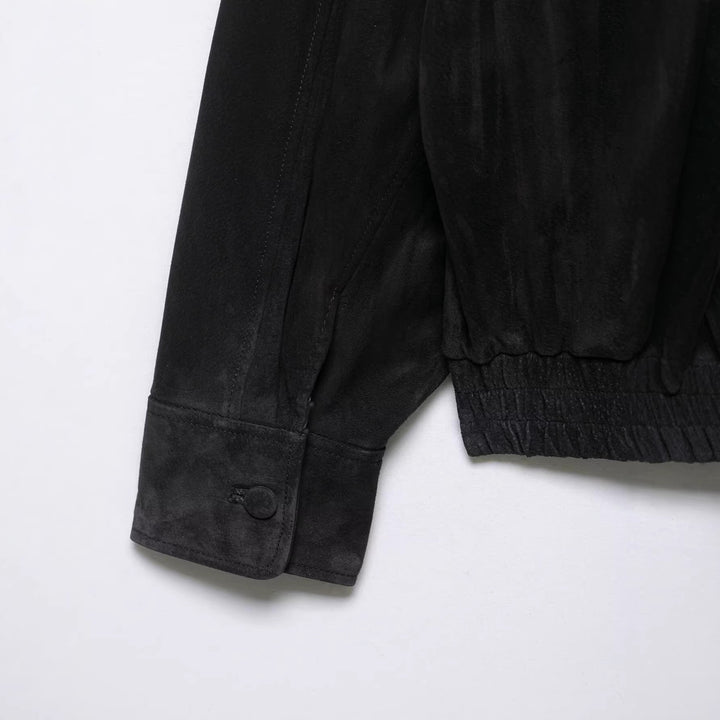 Men's suede jacket with high stand collar, asymmetrical button placket, and elastic hem Mune Fashion