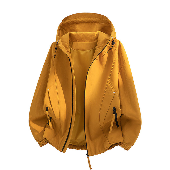 Women's lightweight hooded transitional jacket in oversized cut with elastic hem and concealed zipper pockets Mune Fashion