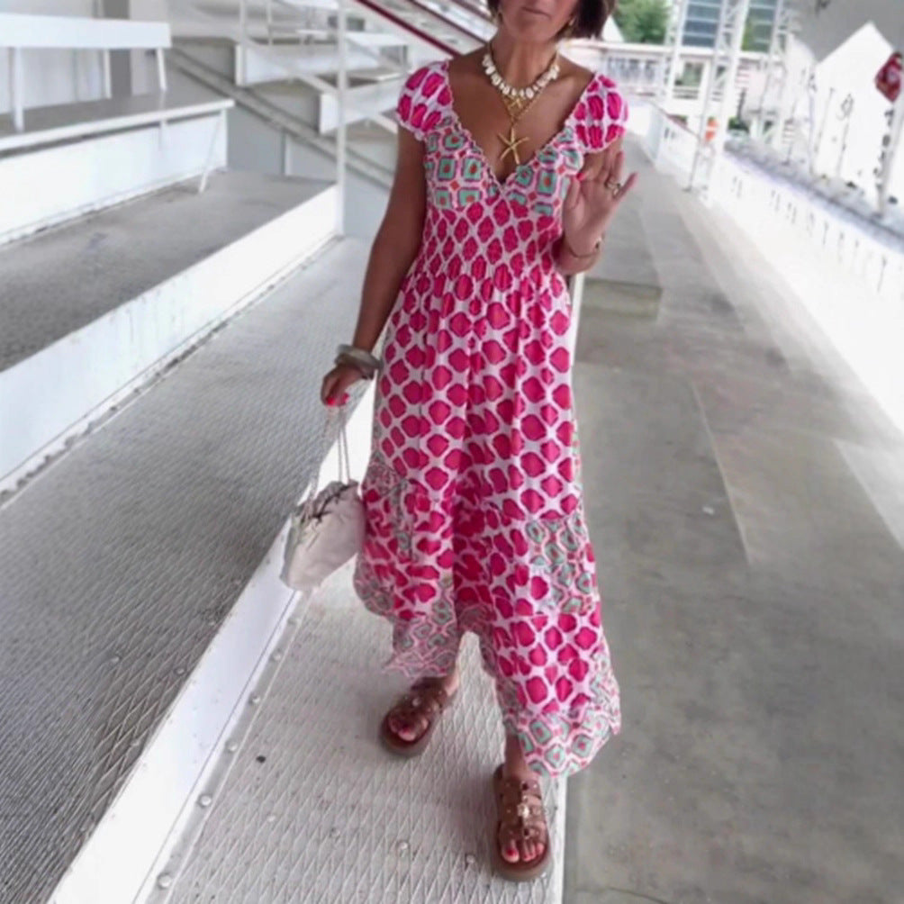 Women’s summer tiered dress with smocked top, V-neckline and puff sleeves Mune Fashion