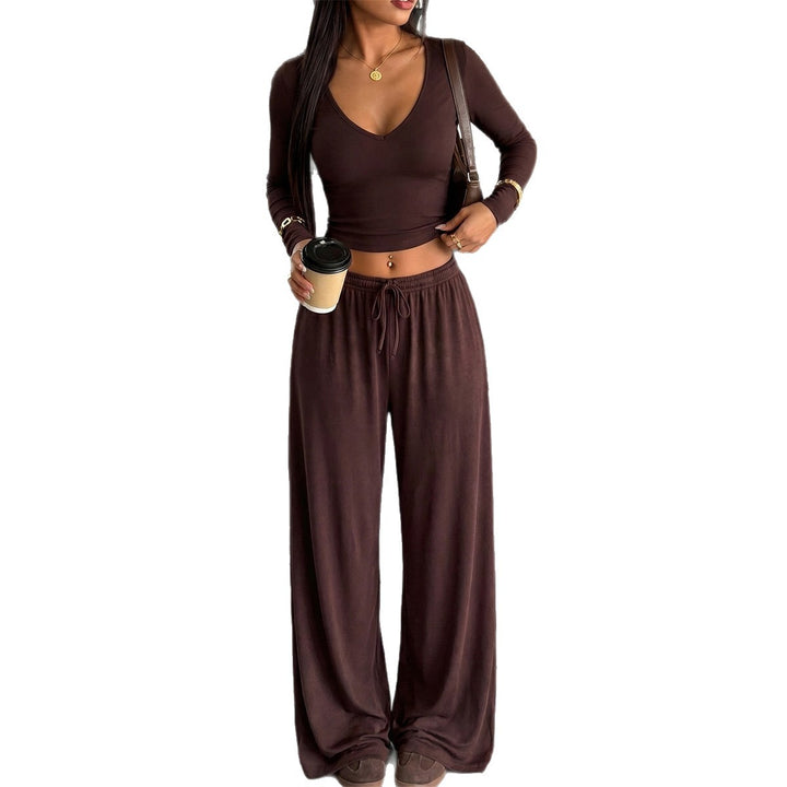 Women's elegant lounge set with form-fitting V-neck long sleeve and wide relaxed pants Mune Fashion