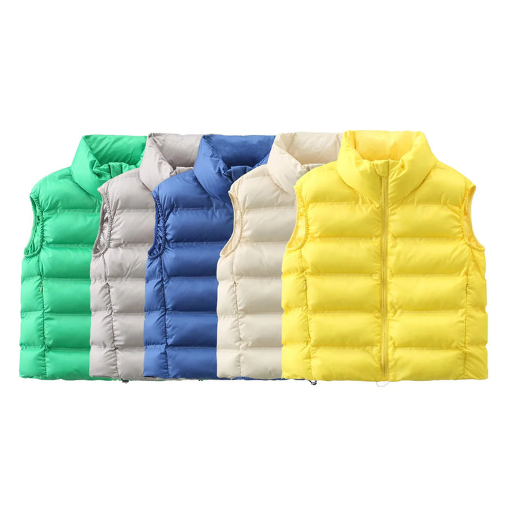 Ladies nan quilted thermal vest with high stand-up collar, side zip pockets, and adjustable hem Mune Fashion