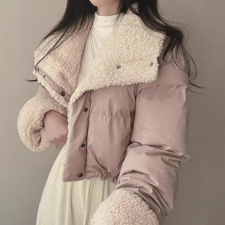 Women's short quilted puffer jacket with teddy collar, roll-up sleeves, and drawstring hem Mune Fashion