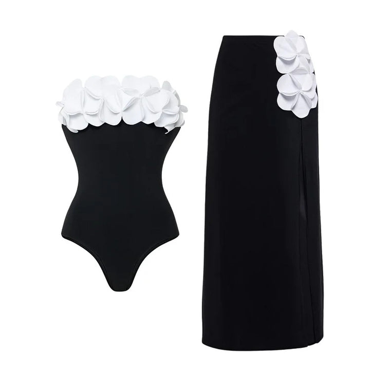 Ladies swimsuit with asymmetric cut and floral appliqués Mune Fashion