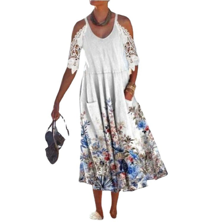 Women’s flowing maxi dress with shoulder cutouts crochet lace sleeves A-line cut and side pockets Mune Fashion