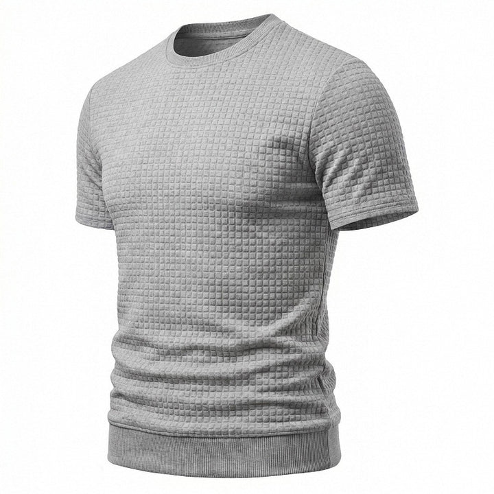 Men's short-sleeved knit shirt with embossed check structure, round neckline, and ribbed hem Mune Fashion