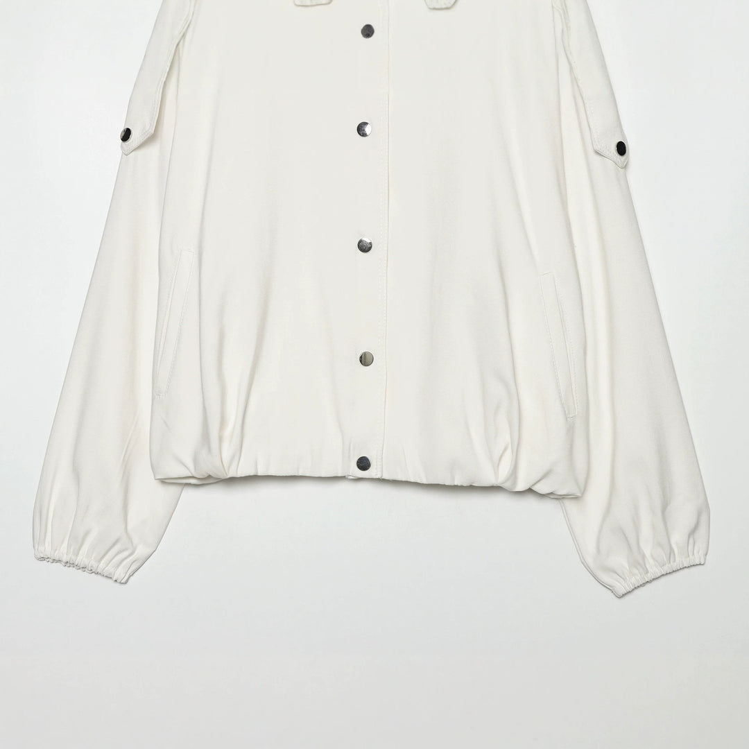 Women's oversized short jacket with high stand-up collar, snap button front, and patch arm pocket Mune Fashion