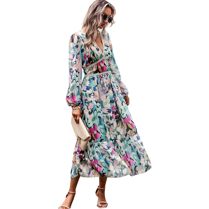 Women's flowing maxi dress with V-neck, gathered empire waist and tiered skirt Mune Fashion