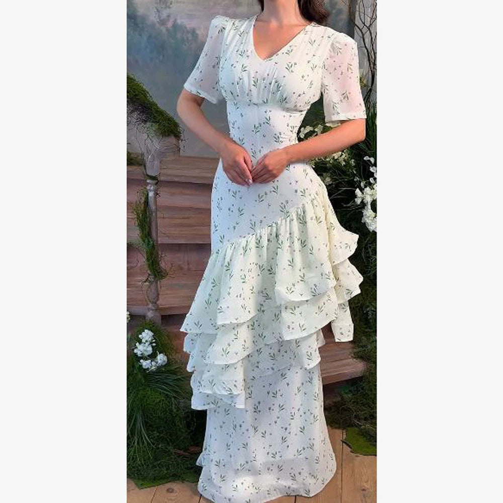 Women’s maxi dress in vintage-romantic style with asymmetric ruffles and puff sleeves Mune Fashion