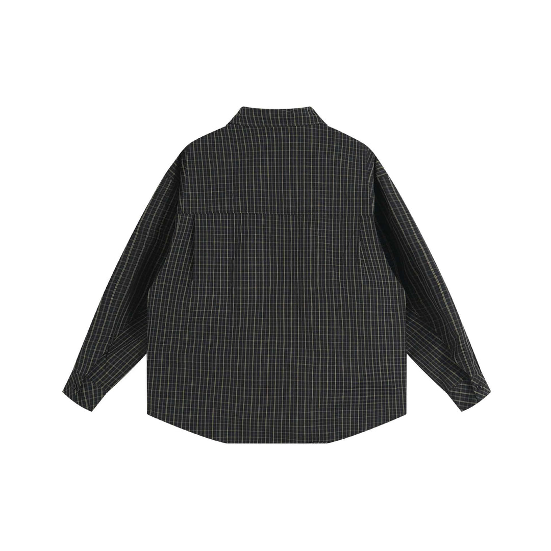 Unisex Boxy Shirt Jacket in oversized boxy cut with Kent collar, breast pocket, and extended back hem Mune Fashion