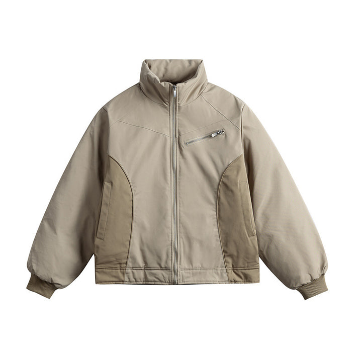 Unisex short cut quilted jacket with stand-up collar and ergonomic side inserts Mune Fashion