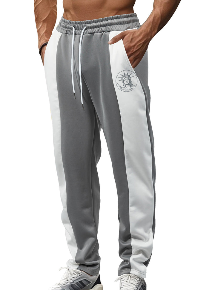 Men's sporty track pants with side contrast stripes, elastic waistband, drawstring, and deer embroidery Mune Fashion