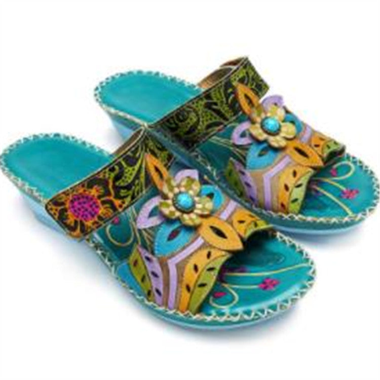 Ladies wedge slide with floral decor and handcrafted leather applications Mune Fashion