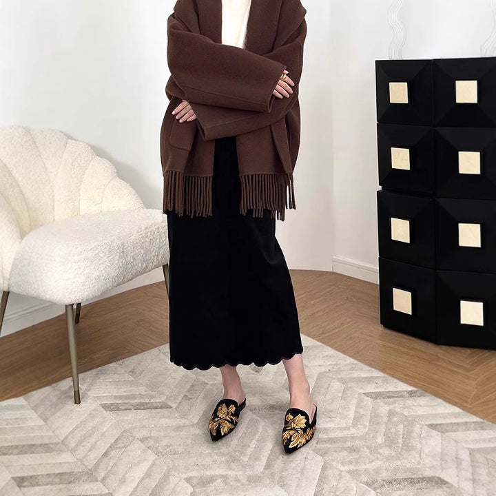 Women Elegant cut Maxi skirt with sculptural hemline Mune Fashion