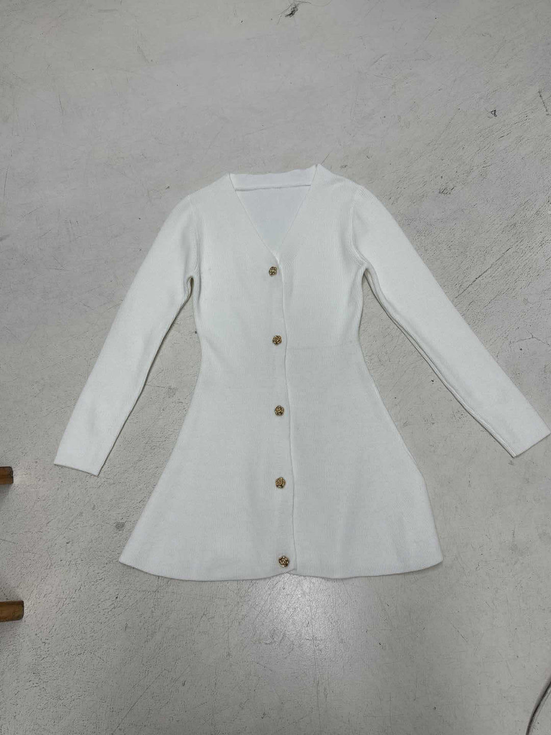 Women tailored knitted dress-cardigan with V-neck and decorative buttons Mune Fashion