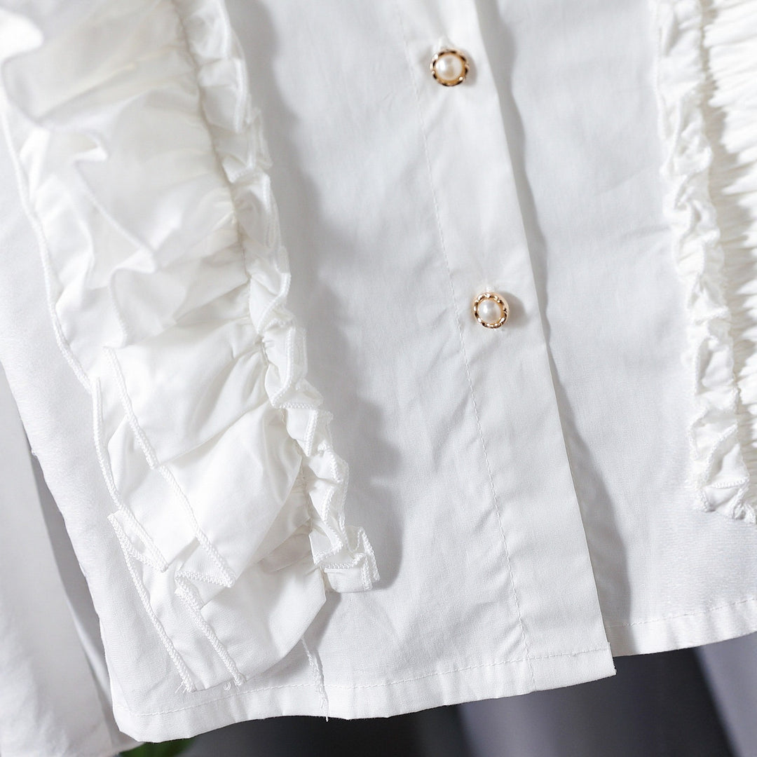 Girls blouse with ruffle details and elegant puff sleeves Mune Fashion