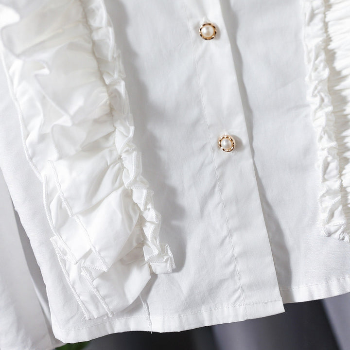 Girls blouse with ruffle details and elegant puff sleeves Mune Fashion