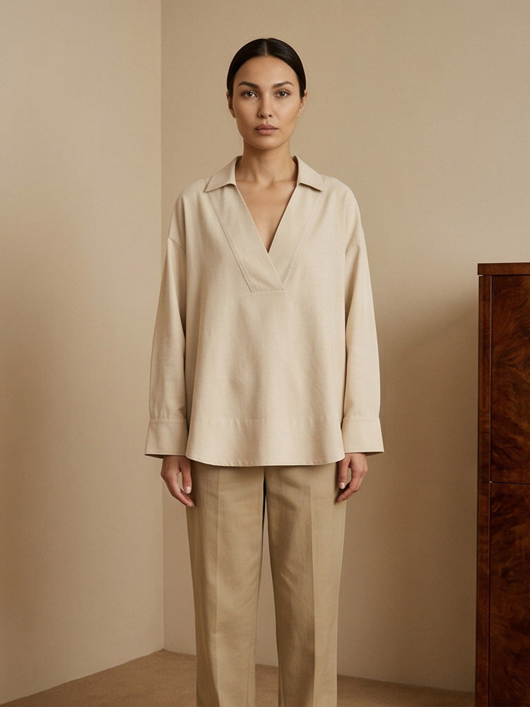 Women's loose-fitting tunic blouse with V-neck, shirt collar, and extended back hem Mune Fashion