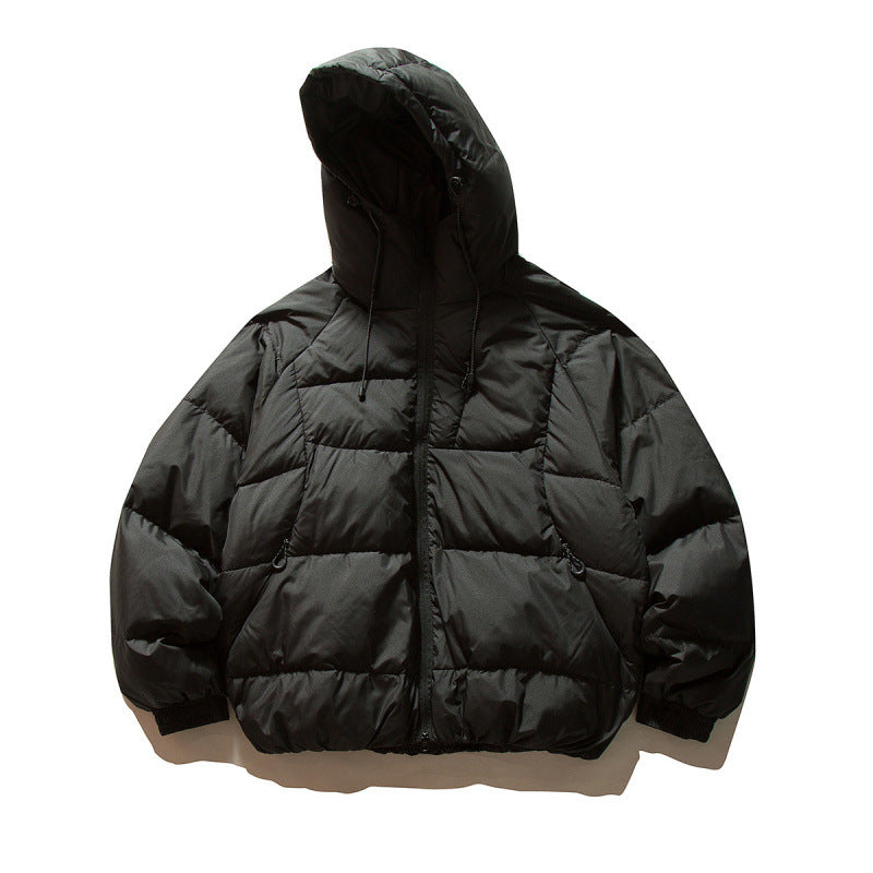 Unisex Oversize quilted jacket in boxy cut with hood and adjustable hem Mune Fashion