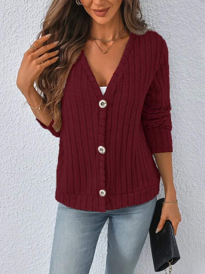 Women’s ribbed V-neck knit cardigan with decorative buttons, slightly dropped shoulder and boxy hem Mune Fashion