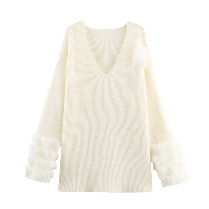 Ladies fine knit mini dress with deep V-neckline and layered faux fur sleeves Mune Fashion