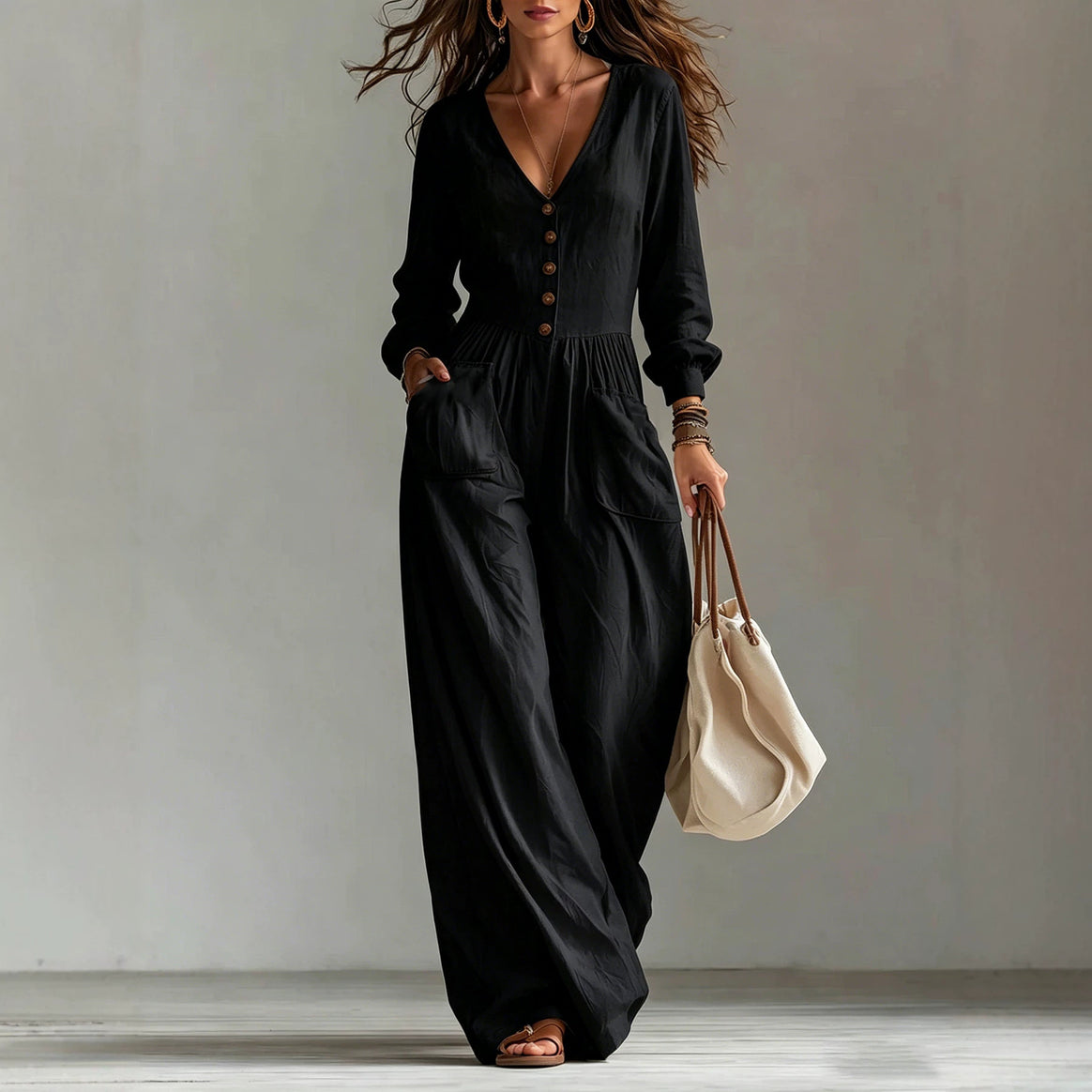 Ladies linen jumpsuit with V-neck, button placket and wide leg cut Mune Fashion
