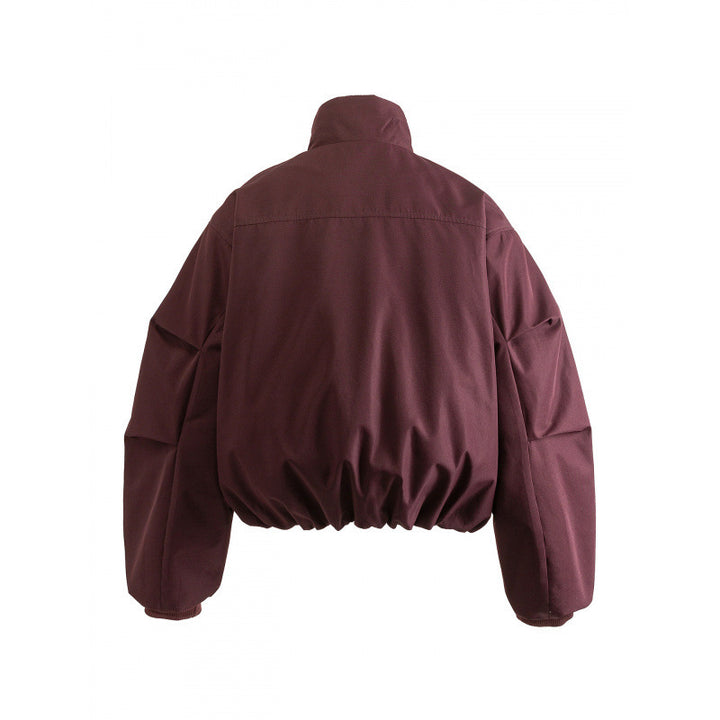 Unisex Boxy quilted bomber jacket with high stand-up collar and flap pockets Mune Fashion