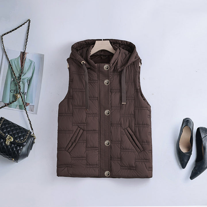 Women's sleeveless quilted hoodie vest with hidden button placket and angled pockets Mune Fashion