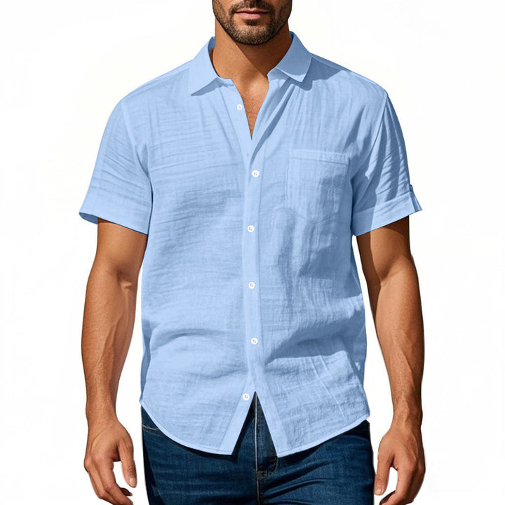 Men's short-sleeved casual shirt made of linen blend with chest pocket and rounded hem Mune Fashion