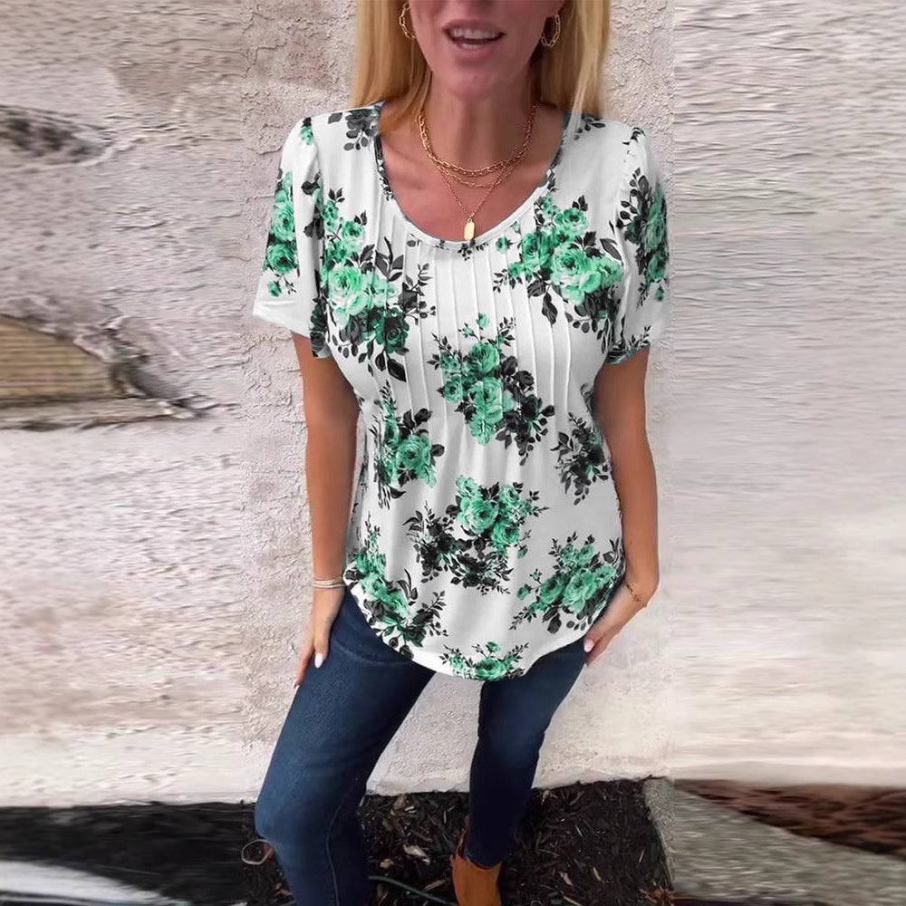 Ladies cropped short sleeve blouse shirt with box pleats and floral print Mune Fashion
