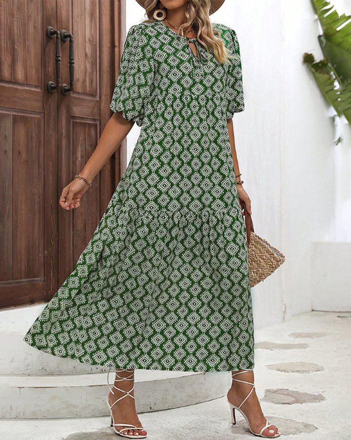 Women’s airy maxi dress with geometric ethnic print, gathered tiered skirt and keyhole neckline Mune Fashion