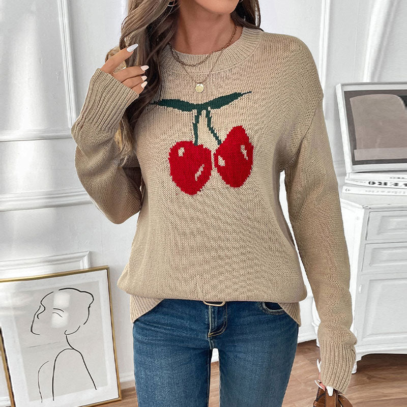 Women’s knitted sweater with cherry intarsia, round neck and casual oversized fit Mune Fashion