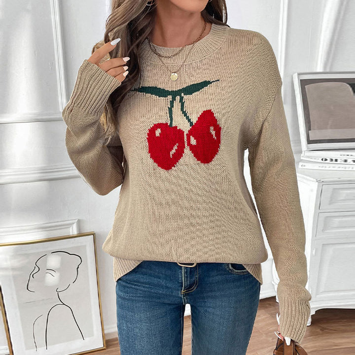 Women’s knitted sweater with cherry intarsia, round neck and casual oversized fit Mune Fashion