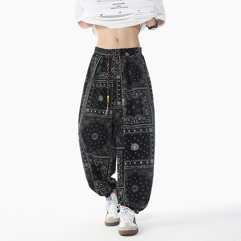 Women's casual pluder pants in ethnic print with elastic waistband, drawstring and smocked cuffs Mune Fashion