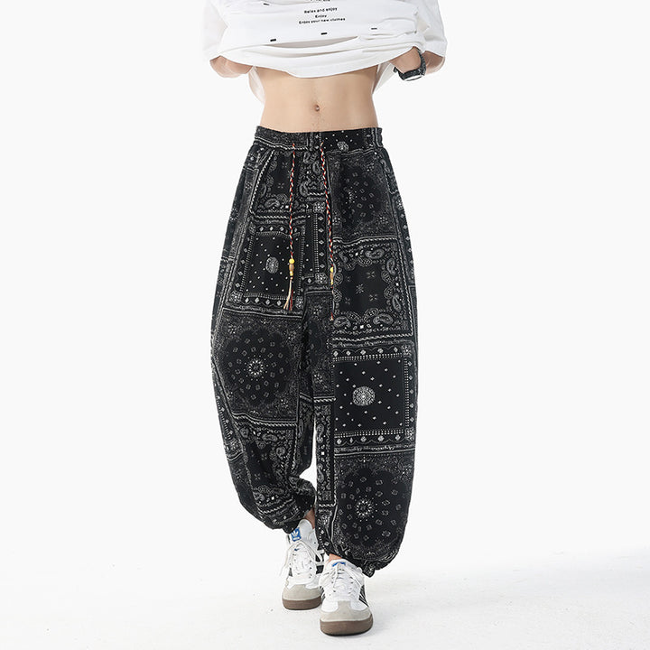 Women's casual pluder pants in ethnic print with elastic waistband, drawstring and smocked cuffs Mune Fashion