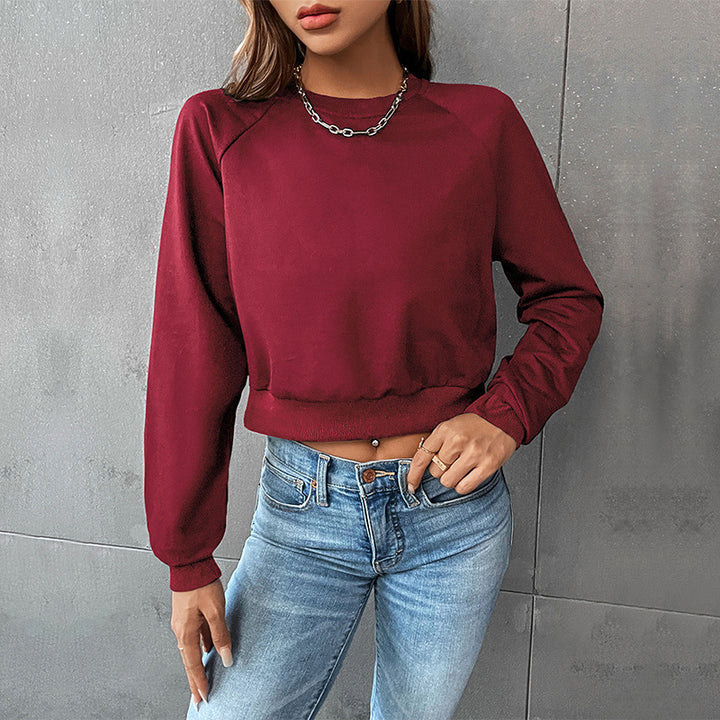 Women's Short Minimalist Sweatshirt with Raglan Sleeves and Ribbed Hem Mune Fashion
