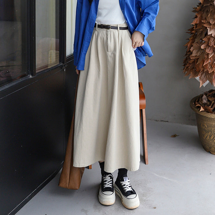 Women's high-waisted A-line maxi skirt with pleated waistband and detachable faux leather belt Mune Fashion