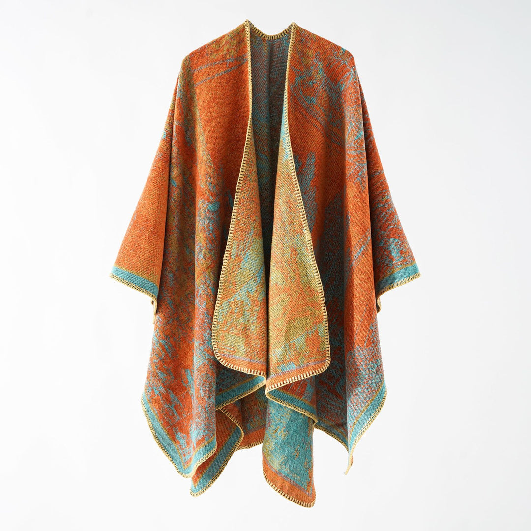 Women Oversize Ruana in boxy cape with jacquard woven structure and soft wool blend drape