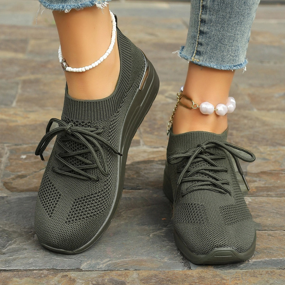 Women’s knit sneakers with wedge sole, sock-like shaft and metallic heel accent Mune Fashion
