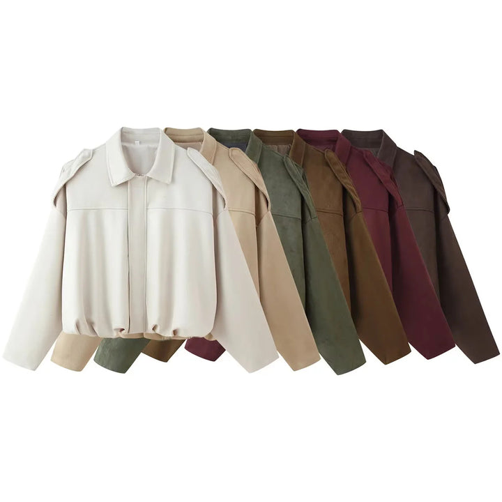 Ladies short cut oversized blouson jacket with shoulder epaulettes, concealed front placket and elastic cord hem Mune Fashion