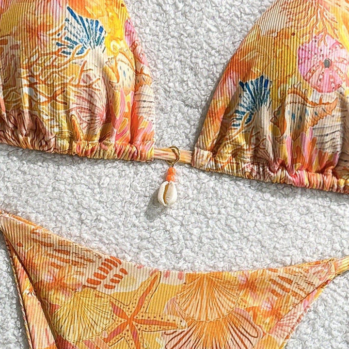 Women's triangle bikini with tropical pattern and playful ties Mune Fashion