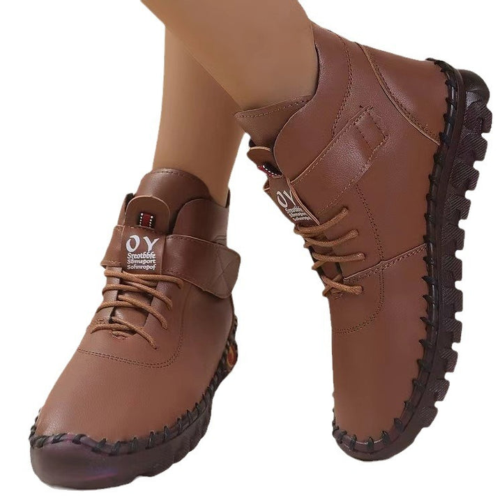 Women's ankle-high casual boots with Velcro, elastic lacing, and distinct tread sole Mune Fashion