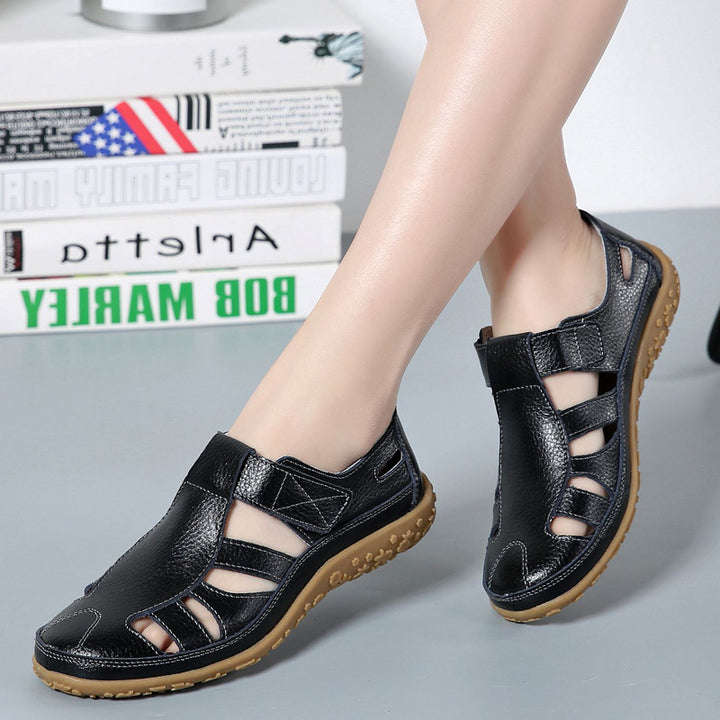 Ladies closed leather summer shoe with cutouts hook and loop fastener and cushioning nub sole Mune Fashion