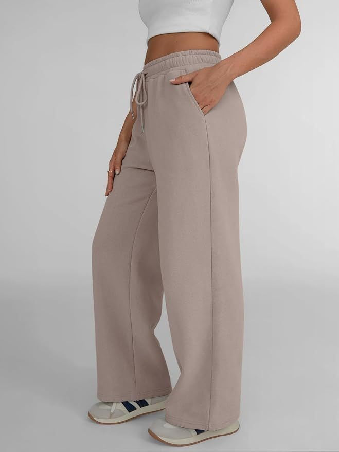 Women's wide lounge pants with high elastic waistband, adjustable drawstring and flowing palazzo silhouette Mune Fashion