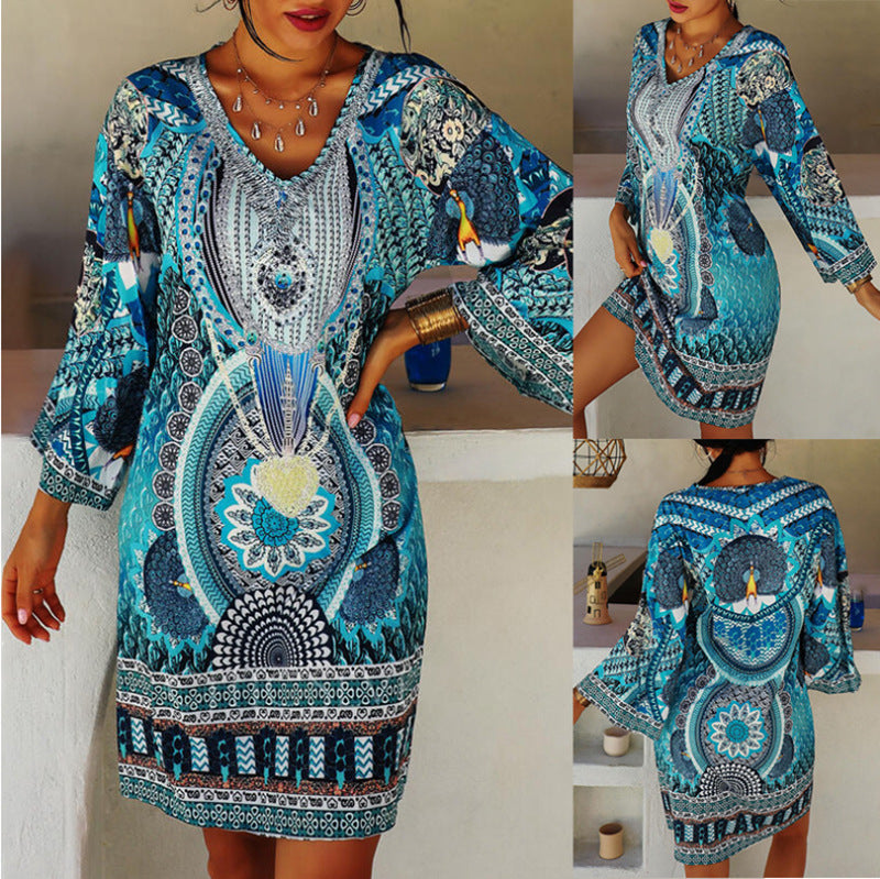 Women's short holiday tunic dress in kaftan style with V-neck and flared kimono sleeves Mune Fashion