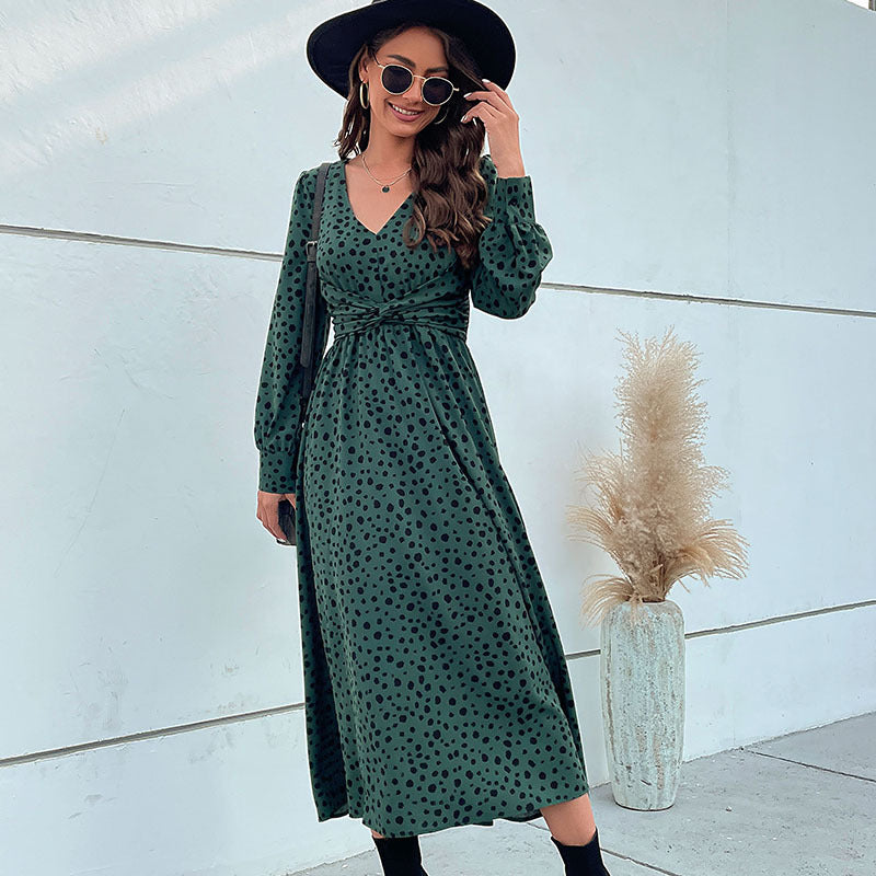 Women's midi dress in retro polka dot design with wrap look, V-neck and tailored tie belt Mune Fashion