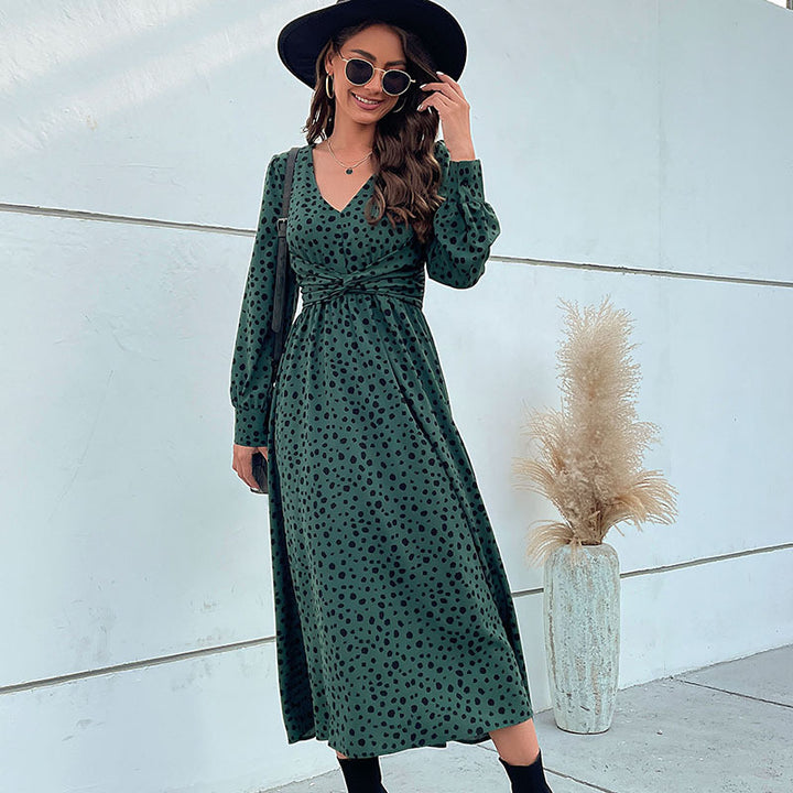 Women's midi dress in retro polka dot design with wrap look, V-neck and tailored tie belt Mune Fashion