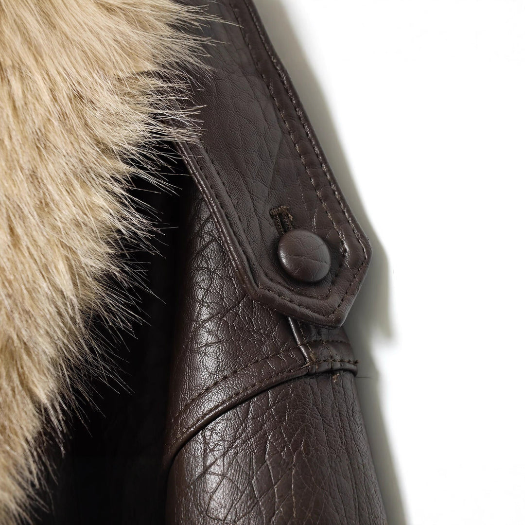 Women's short-cut bomber jacket made of leather look with voluminous faux fur collar Mune Fashion