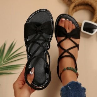 Damen Zarte Römersandalen mit Schleifen-Detail und verstellbaren Schnürriemen Mune Fashion